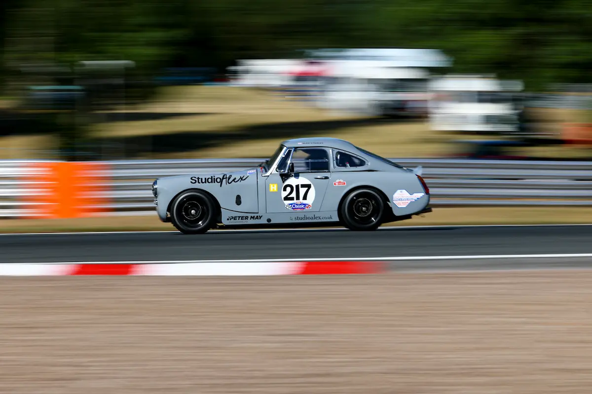 Austin-Healey Sprite 217 at Oulton Park following race preparation and trackside support from MCR