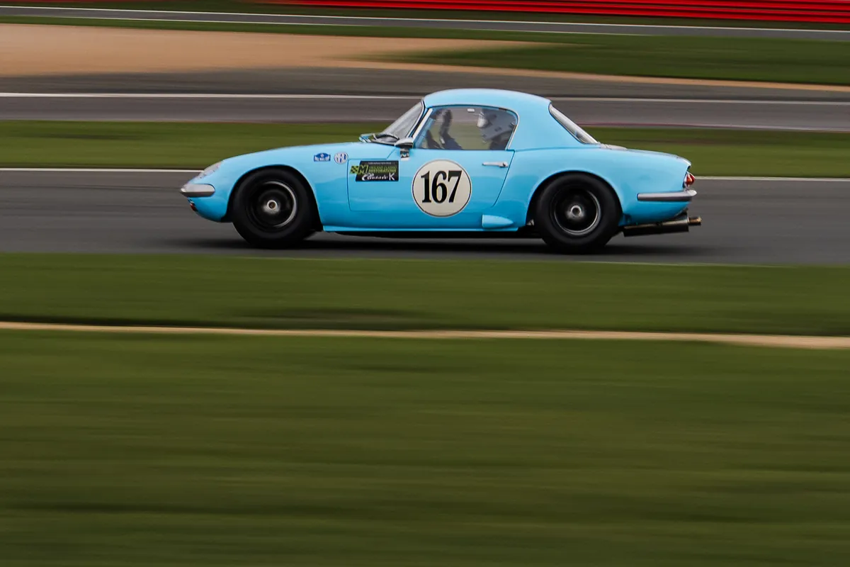 James Hughes in the blue Lotus Elan 167 during the Pall Mall Cup at Silverstone